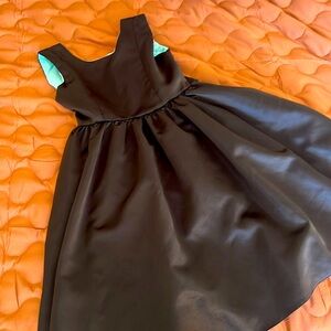 Elegant Black Dress with Teal Accents